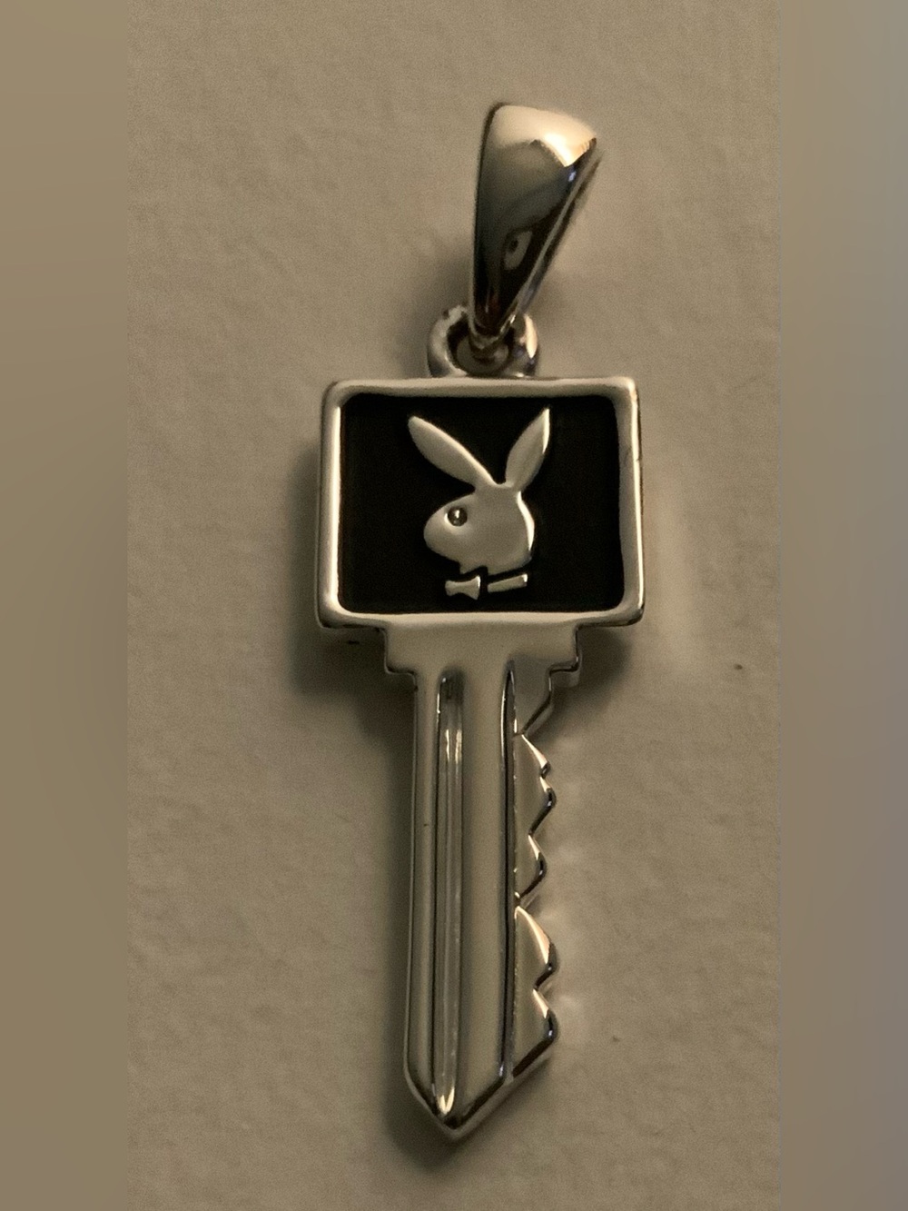 Playboy Y2K bunny key necklace. This comes with chain.